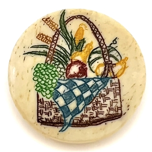 Incised and inked natural material button a full picnic basket.