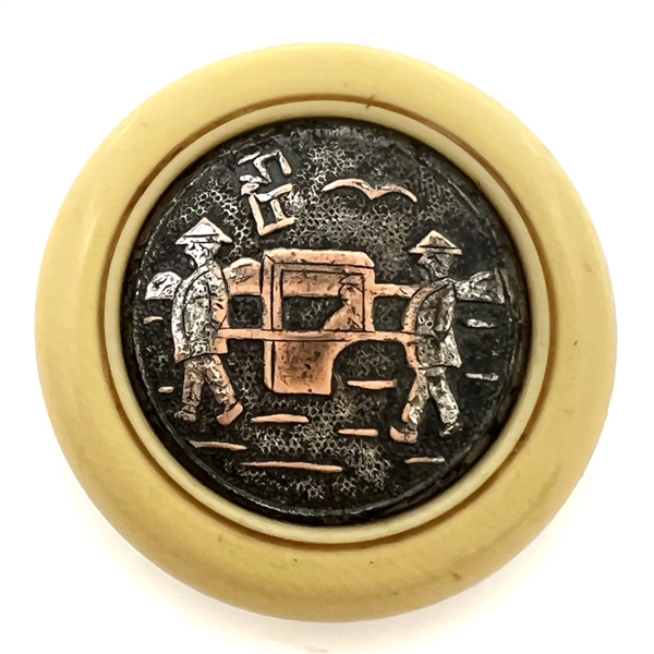 Japanese silvered metal work of a rickshaw set in natural material button.