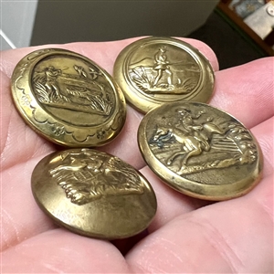 Four brass sporting buttons of hunters
