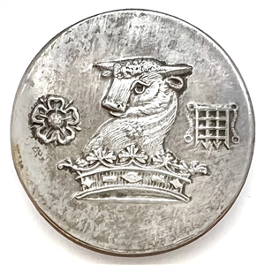 Silvered copper Livery button of the Neville family crest of a bull.