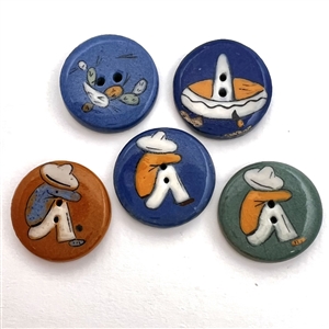 Five ceramic buttons with Mexican themes.