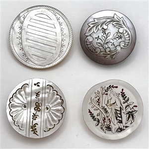 Four 19th c. Pearl and shell buttons including a woman picking fruit.