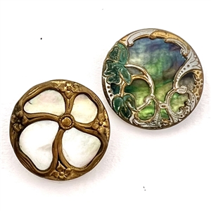 Two Art Nouveau metal over shell buttons. 