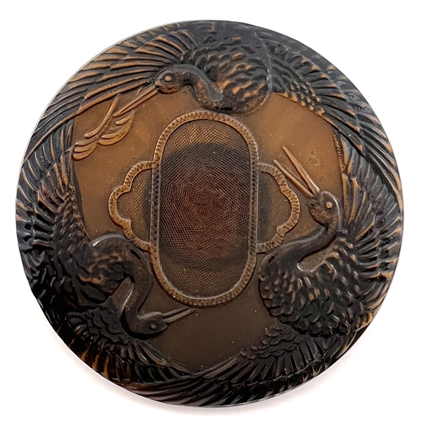 Extra large vintage celluloid button of three cranes.