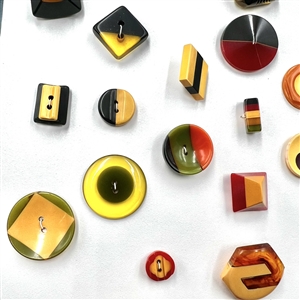 Card of thirty five vintage Bakelite cookies buttons. 