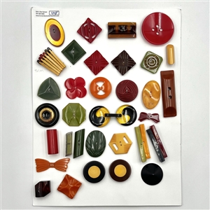 Card of thirty three large vintage Bakelite buttons (one is a buckle and one is trim.)
