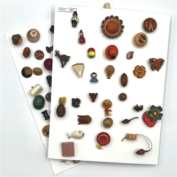 Two cards of 99 wood buttons. 