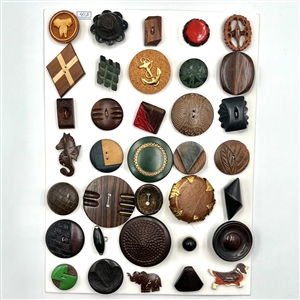 Card of thirty five “mostly" wood buttons.