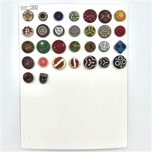 Card of thirty buffed celluloid buttons.