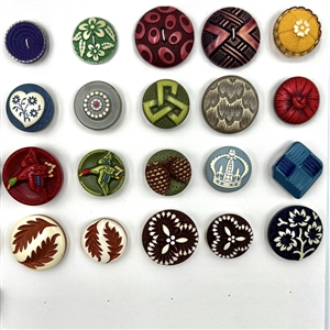 Card of thirty buffed celluloid buttons.