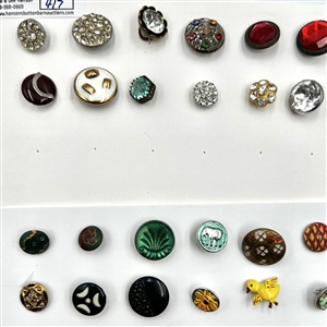 Card of seventy one assorted buttons.