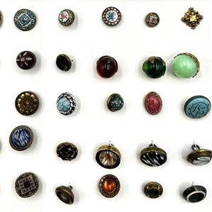 Card of seventy one assorted buttons.