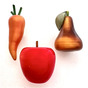 Three vintage celluloid buttons of fruits and veggies.