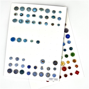Two cards of 104 clear and colored glass buttons. 