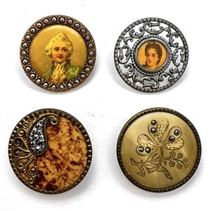 Four buttons with celluloid elements.