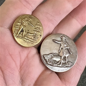 Two sporting buttons of hunters.