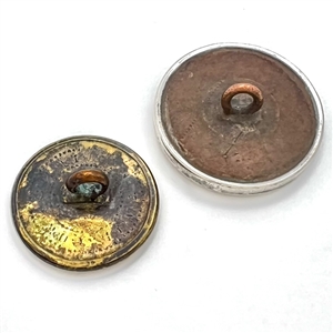 Two sporting buttons of hunters.