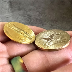 Two gilded brass sporting running hound and fox.
