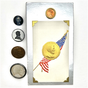 Six Abraham Lincoln commemorative buttons.