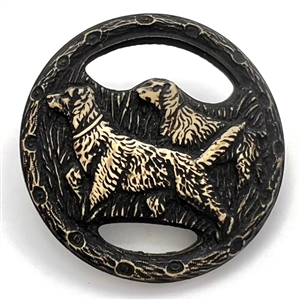 Vintage one-piece 30s buffed celluloid button of hunting dogs.