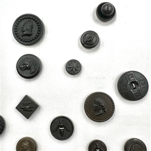 Two cards of 51 Goodyear rubber and other rubber buttons.