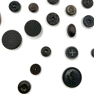 Two cards of 51 Goodyear rubber and other rubber buttons.