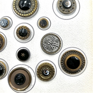 Card of 25 black glass in metal buttons.