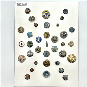 Card of 35 enamel buttons.