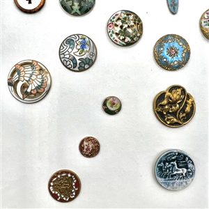 Card of 35 enamel buttons.