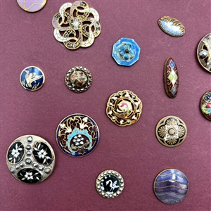 Card of 36 enamel buttons. 