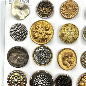 Card of 35 assorted pictorial metal buttons.