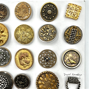 Card of 35 assorted pictorial metal buttons.