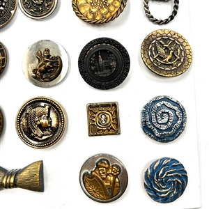 Card of 35 assorted pictorial metal buttons.
