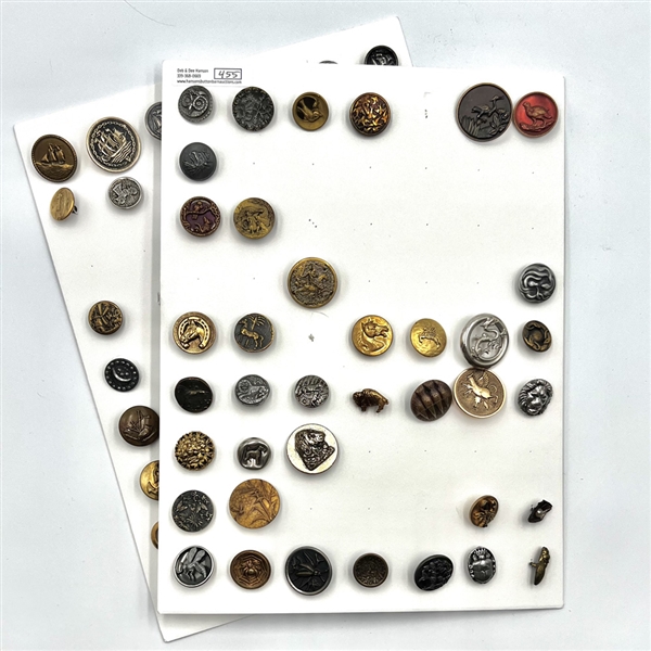 Two cards of 64 animal and other metal pictorial  buttons. 