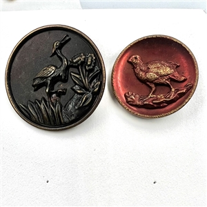 Two cards of 64 animal and other metal pictorial  buttons. 