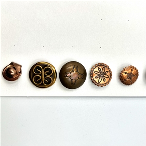Three cards of 137 assorted metal buttons. 
