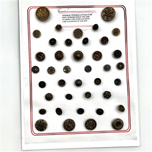 Three cards of 137 assorted metal buttons. 