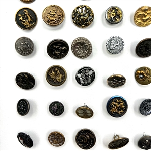 Card of 87 small metal picture buttons. 