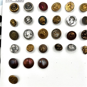 Two cards of 99 metal picture buttons. 