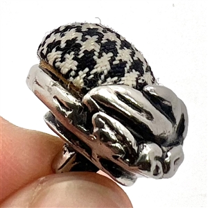 RARE Metalized British Bakelite  button of hands holding a fabric ball. 