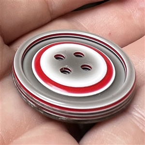 Rhodoid target button by Lea Stein.