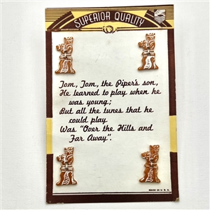 Card of four vintage Bakelite “Tom, Tom, the Pipers son" buttons on original store card.