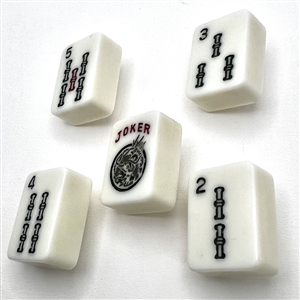 Set of five plastic mahjong buttons.