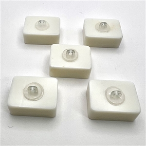 Set of five plastic mahjong buttons.