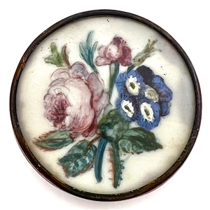 An 18th c. Painting on natural material  button of flowers.