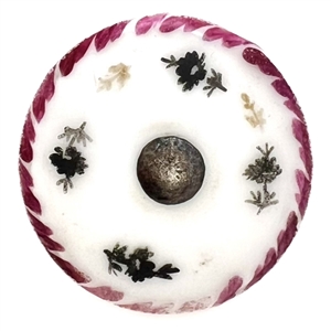 An 18th c. Transfer and painted porcelain button with silver pin shank.