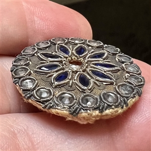 An 18th c. Passementerie button with gold bullion and colored pastes.