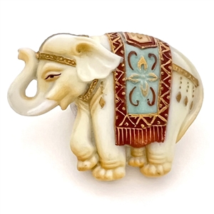 Arita porcelain button of a realistic Indian elephant.