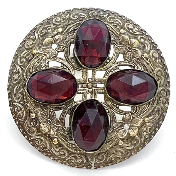 Victorian jewel button with faceted purple oval glass “jewels".