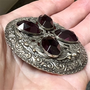 Victorian jewel button with faceted purple oval glass “jewels.